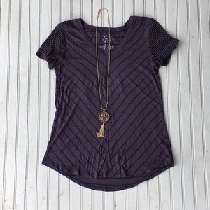 Maurice’s striped purple and black top